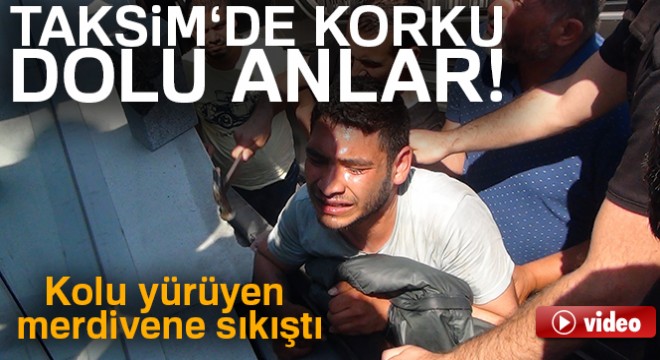 Taksim Meydanı'nda kolu yürüyen merdivene sıkışan şahsı itfayie kurtardı